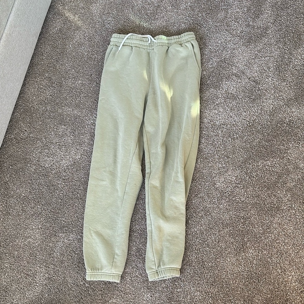 green sweatpants
